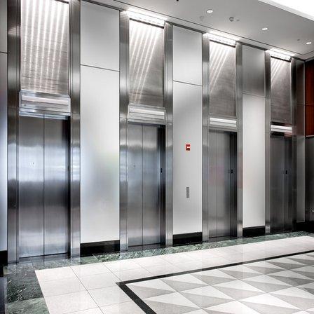 A modern, high-capacity passenger lift designed for commercial buildings.